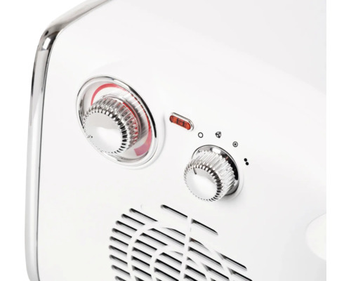 Närbild av en elektrisk värmare med rattar för temperatur- och fläktinställningar