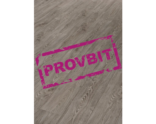 Närbild av ett laminatgolv med trästruktur