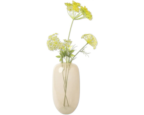 Dekorativa gula blommor i en beige glasvas