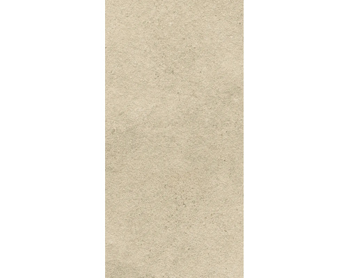 Ljus naturstensplatta med oregelbunden textur