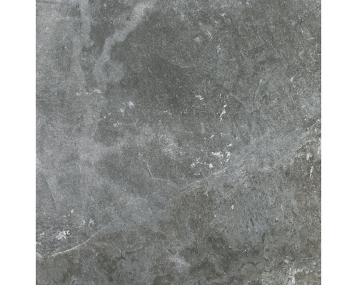 Närbild av en grå golvplatta med betongutseende