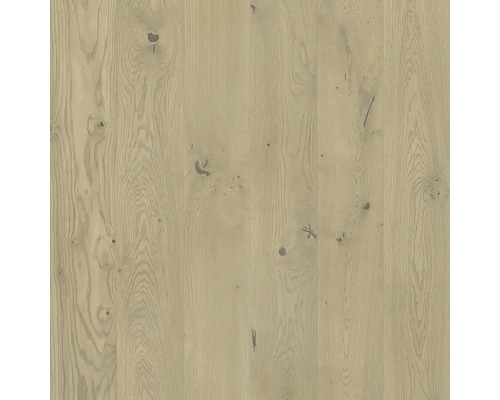 Närbild av ljust ekparkettgolv med kvistar