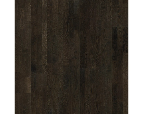 Närbild av ett mörkt träparkettgolv.