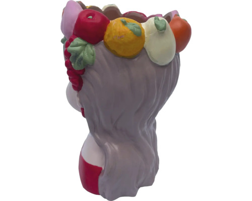 Blomkruka i form av ett kvinnohuvud med fruktdekoration