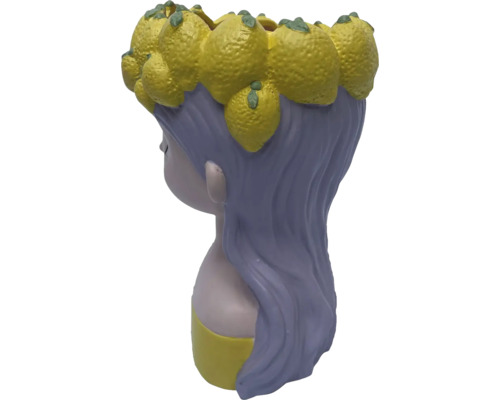 Blomkruka i form av en kvinna med citroner på huvudet