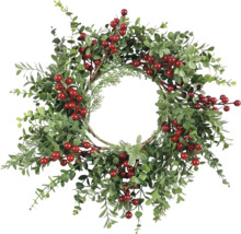 Dekorativ krans med gröna blad och röda bär