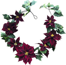 Julstjärnekrans med gröna blad