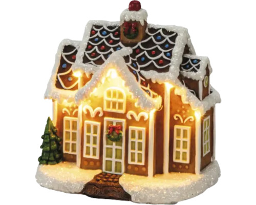 Pepparkakshus med belysning och dekoration Pepparkakshus med belysning och dekoration