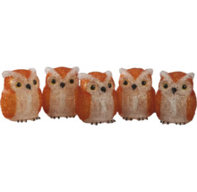 Dekorativa ugglafigurer av plast