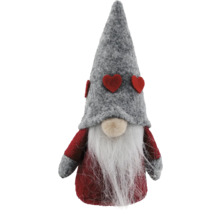 Dekorativ dvärgfigur med långt skägg och hjärtdekorationer på hatten