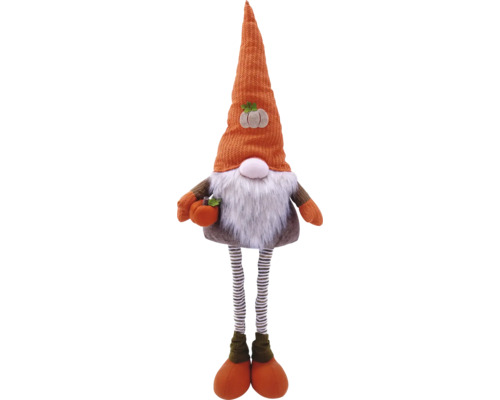 Dekorativ hösttomte med randiga ben och pumpa i handen