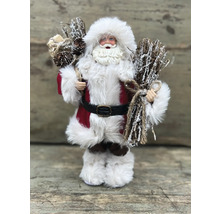 Dekorativ jultomte med grenar i handen som juldekoration