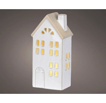 Dekorativt ljushus med fönster och skorsten