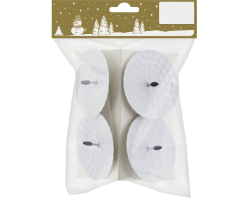 Fyra runda möbelglidare med stift i en transparent förpackning.