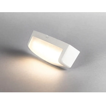 Vit LED-vägglampa på väggen