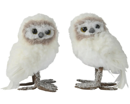 Två vita tygugglor som dekoration