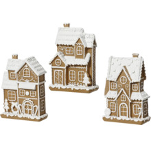 Tre dekorativa pepparkakshus för julperioden