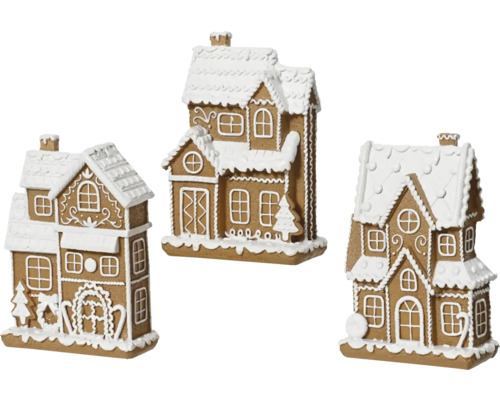 Tre dekorativa pepparkakshus för julperioden