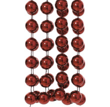 Girlang med röda kulor som dekoration