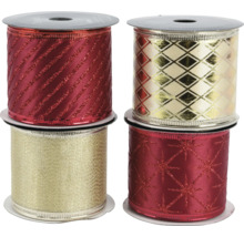 Fyra rullar mönstrat dekorativt band.