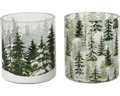 Två värmeljushållare i glas med vinterlandskapsmotiv.