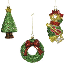 Tre julgranskulor: julgran, krans och musikinstrument.