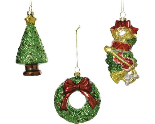 Tre julgranskulor: julgran, krans och musikinstrument.