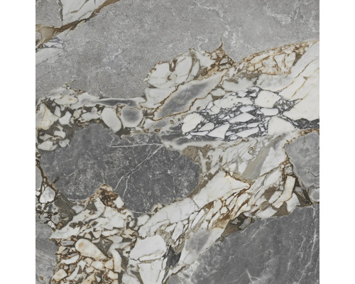 Närbild av en kakelplatta med marmorlook