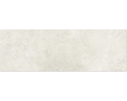 Ljust keramikkakel med spräcklig yta