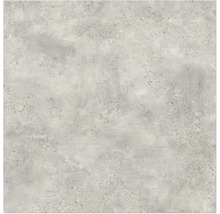 Betongplatta med spräcklig textur för golv- och väggdesign.