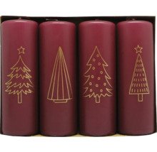Fyra lila blockljus med gyllene julmotiv