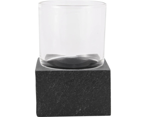 Glaslykta på fyrkantig bas av sten