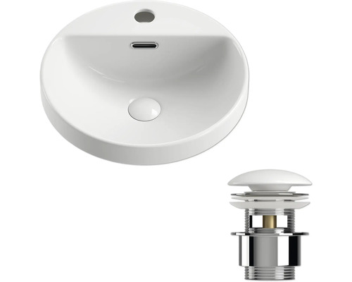 Keramiskt tvättställ och avloppssats för ett badrum.