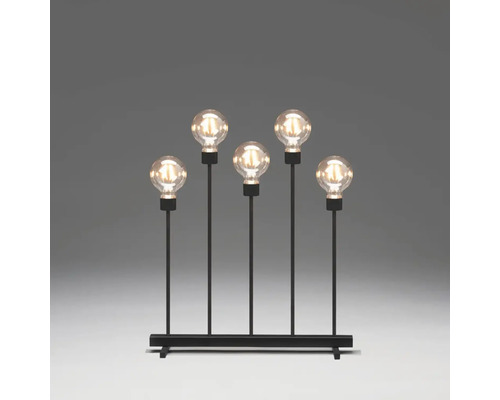 Dekorativ bordslampa med fem glödlampor på en svart metallbas