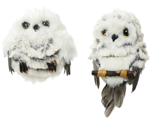 Två dekorativa, fjäderprydda ugglafigurer