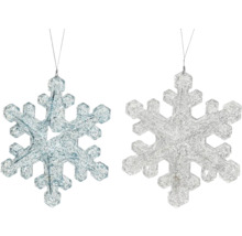Två glittrande snöflingor för dekoration