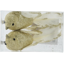 Två glittrande guldfärgade fågelklämmor med fjädrar i en transparent förpackning.