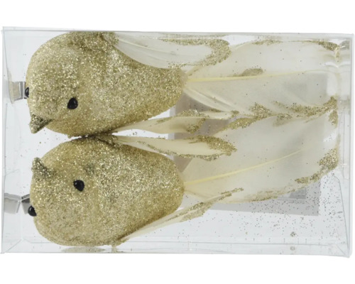 Två glittrande guldfärgade fågelklämmor med fjädrar i en transparent förpackning.