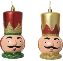 Två nötknäppare julgranskulor med ansikten och hattar