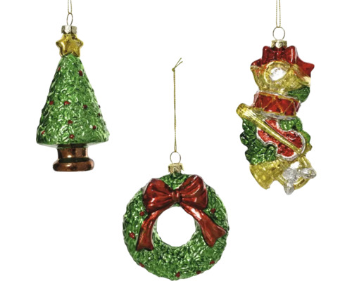 Julgranshänge figur plast blandade utföranden Tre hängande julgranskulor i form av en julgran, en krans och en musiker med instrument.