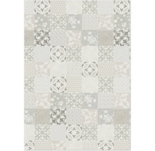 Kakelmönster med olika blommiga och geometriska motiv