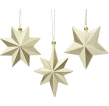 Tre hängande stjärnor som juldekorationer