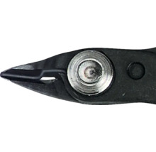 Detaljbild av en avbitartång med led