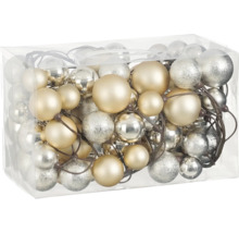 Julgranskulor i en transparent plastlåda