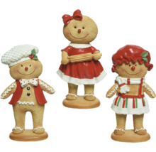 Tre pepparkaksfigurer som juldekoration
