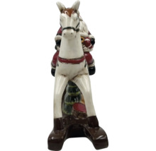 Jultomte på gunghäst dekoration