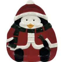 Tallrik i form av en pingvin med mössa och kappa