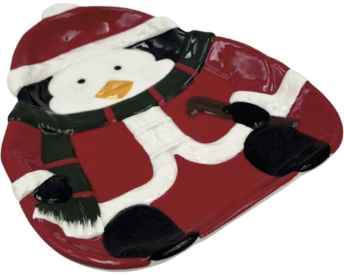 Tallrik i form av en pingvin med vinterkläder