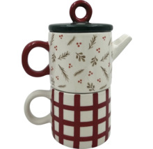 Tekanna med kopp, med rutmönster och växtmotiv