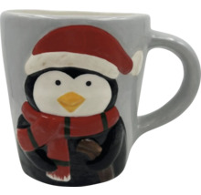 Grå mugg med pingvin, mössa och halsduk